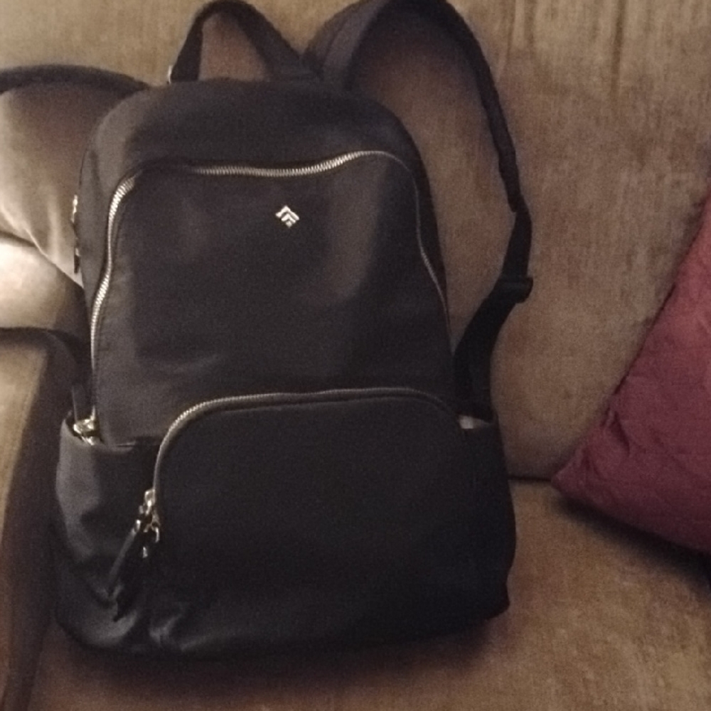 Sleek Black Leather Backpack with Structured Design